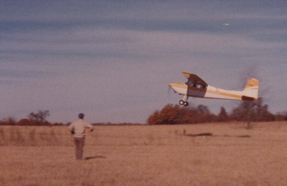 Ted Kasper's Cessna 140 taking off, circa 1980s.jpg